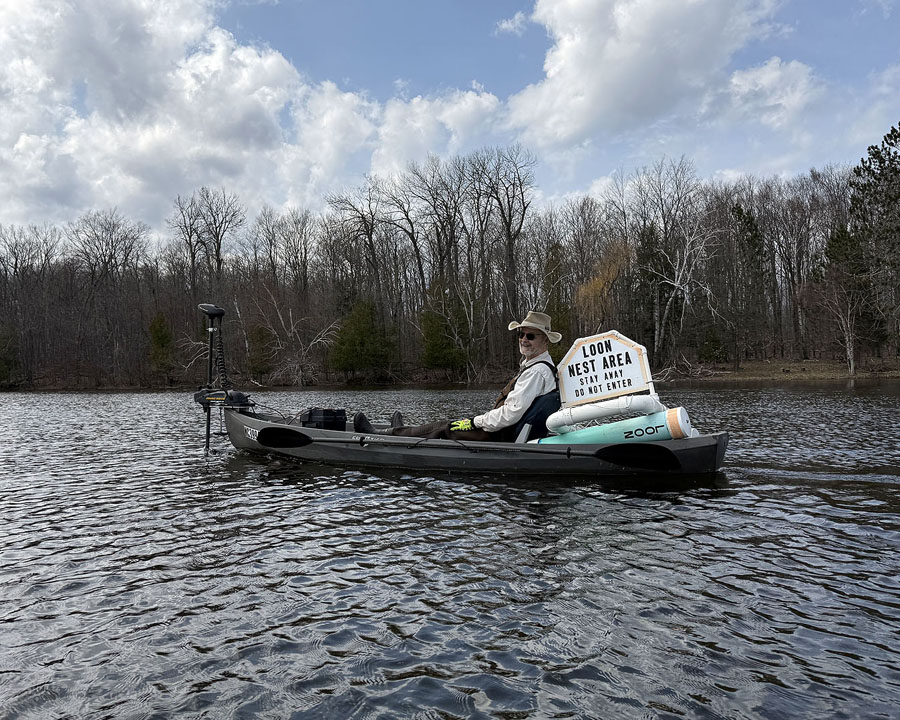 Hauling the buoys and sign